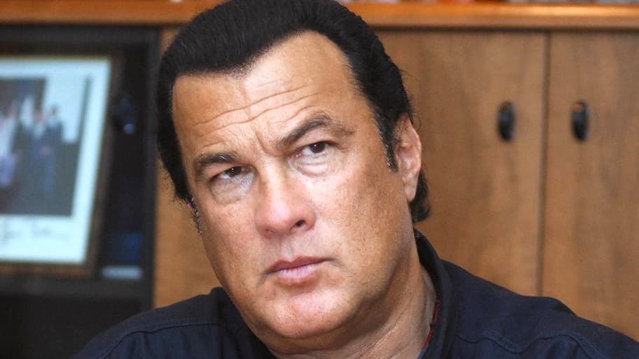 Sylvester Stallone Once Slammed Steven Seagal Into A Wall